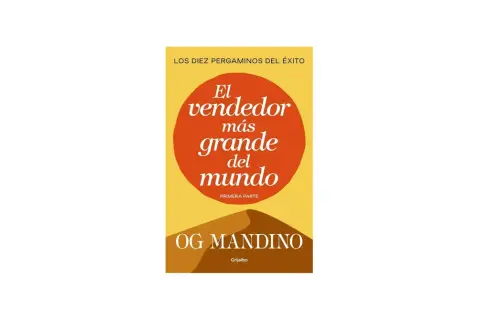 Portada del libro "El vendedor más grande del mundo" de Og Mandino. Un diseño minimalista con un círculo naranja sobre fondo amarillo y dunas de arena.