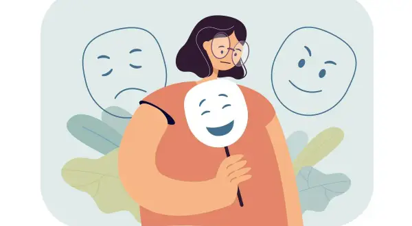 Persona con máscara sonriente, ocultando su tristeza. Un reflejo de la anestesia emocional en la sociedad actual.