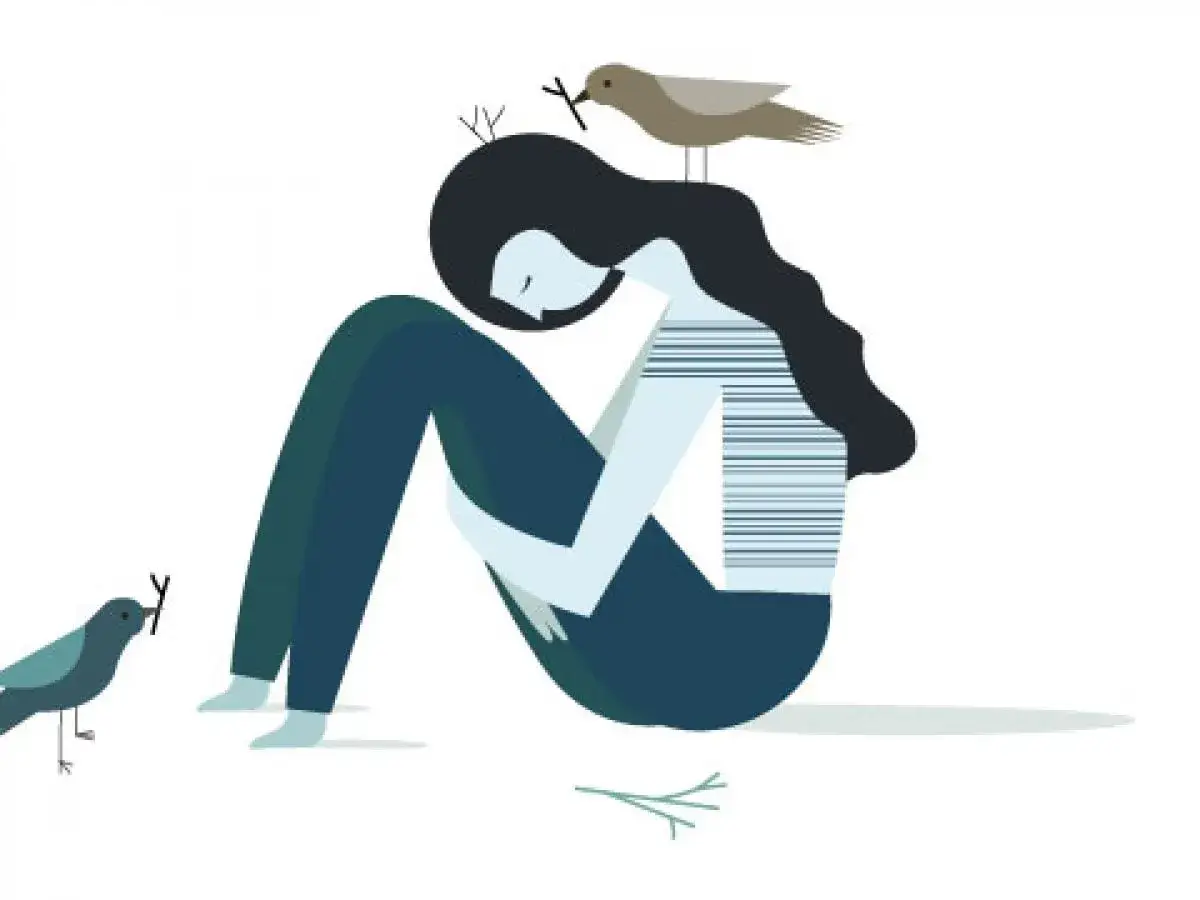 Una persona sentada, abrazando sus rodillas, con pájaros que le traen ramitas. Representa la depresión reactiva y la esperanza.